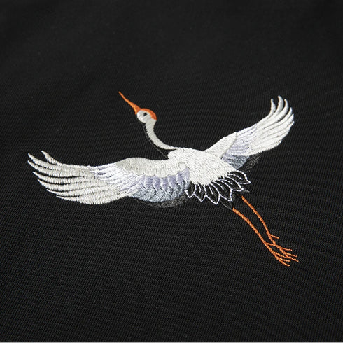 crane sweatshirt, embroidered sweatshirt, vintage sweatshirt, asian-inspired fashion, japanese embroidery, streetwear sweatshirt, aesthetic pullover, retro streetwear, unisex sweatshirt, cozy embroidered top, soft fleece sweatshirt, minimalist embroidery, traditional crane design, heritage fashion, oversized sweatshirt
